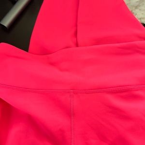 NWOT never worn or washed/dried Bright Coral Leggings